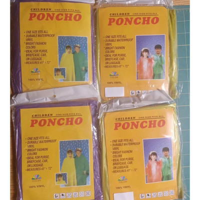 Poncho,Rain Coats for Children One Size Fits all.
